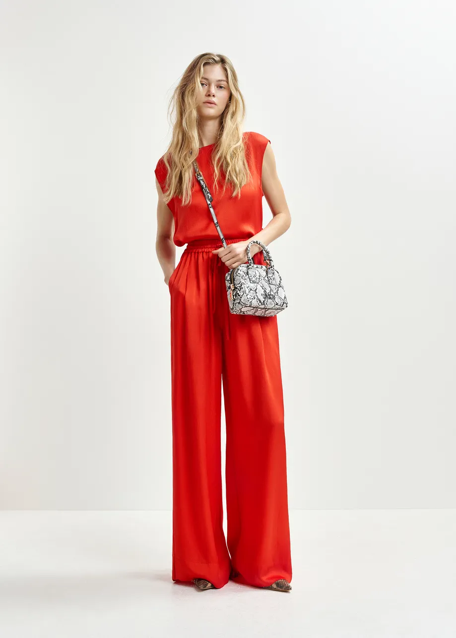 Red sleeveless top
