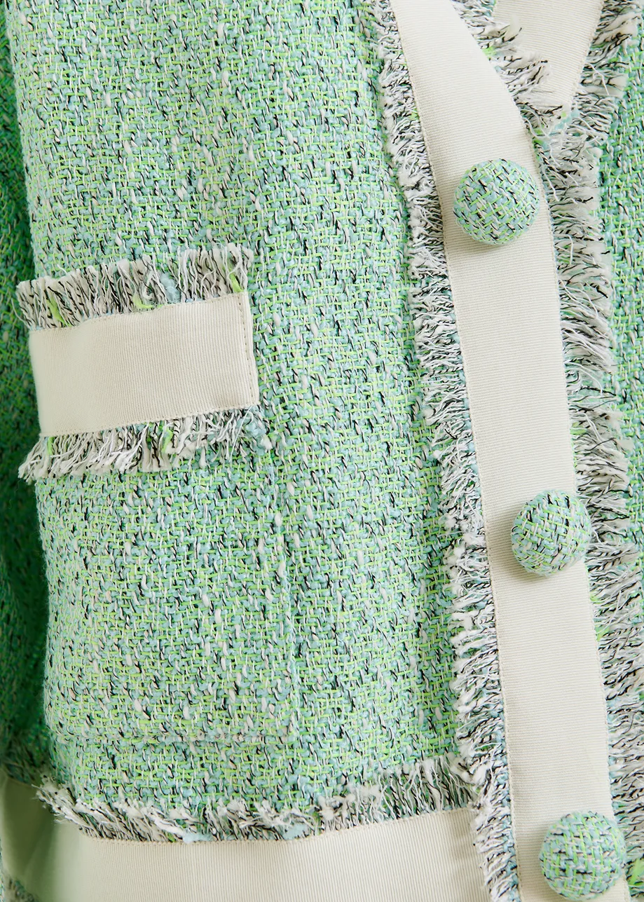 Korte muntgroene, witte en grijze cardigan in tweed