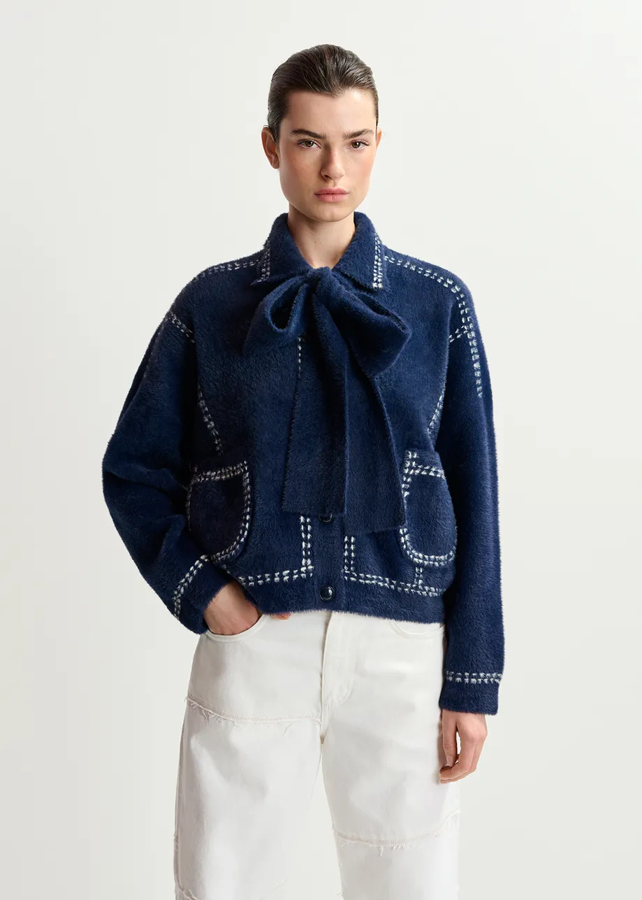 Dark blue knit with contrasting stitching and self-fabric scarf