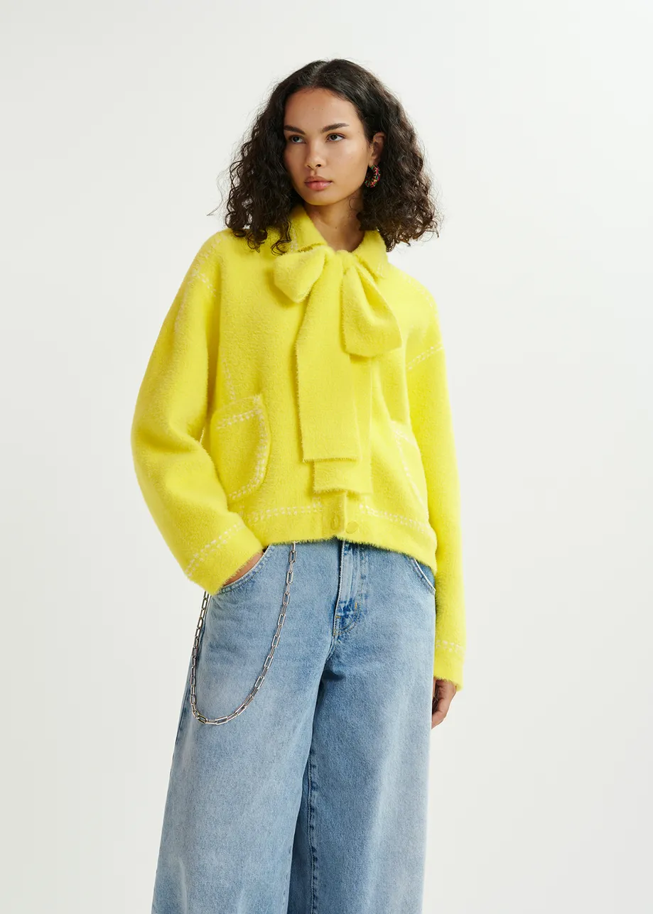 Yellow knit with contrasting stitching and self-fabric scarf