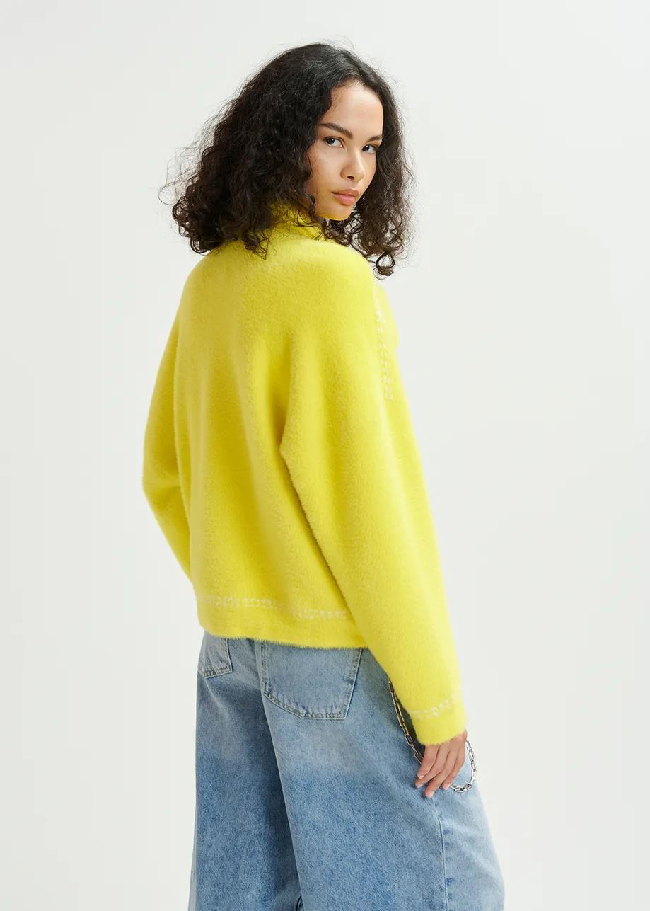 Yellow knit with contrasting stitching and self-fabric scarf