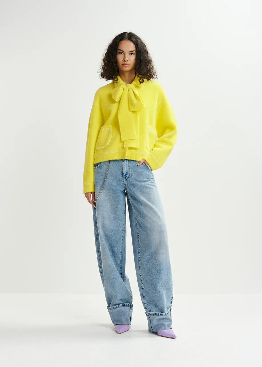 Yellow knit with contrasting stitching and self-fabric scarf