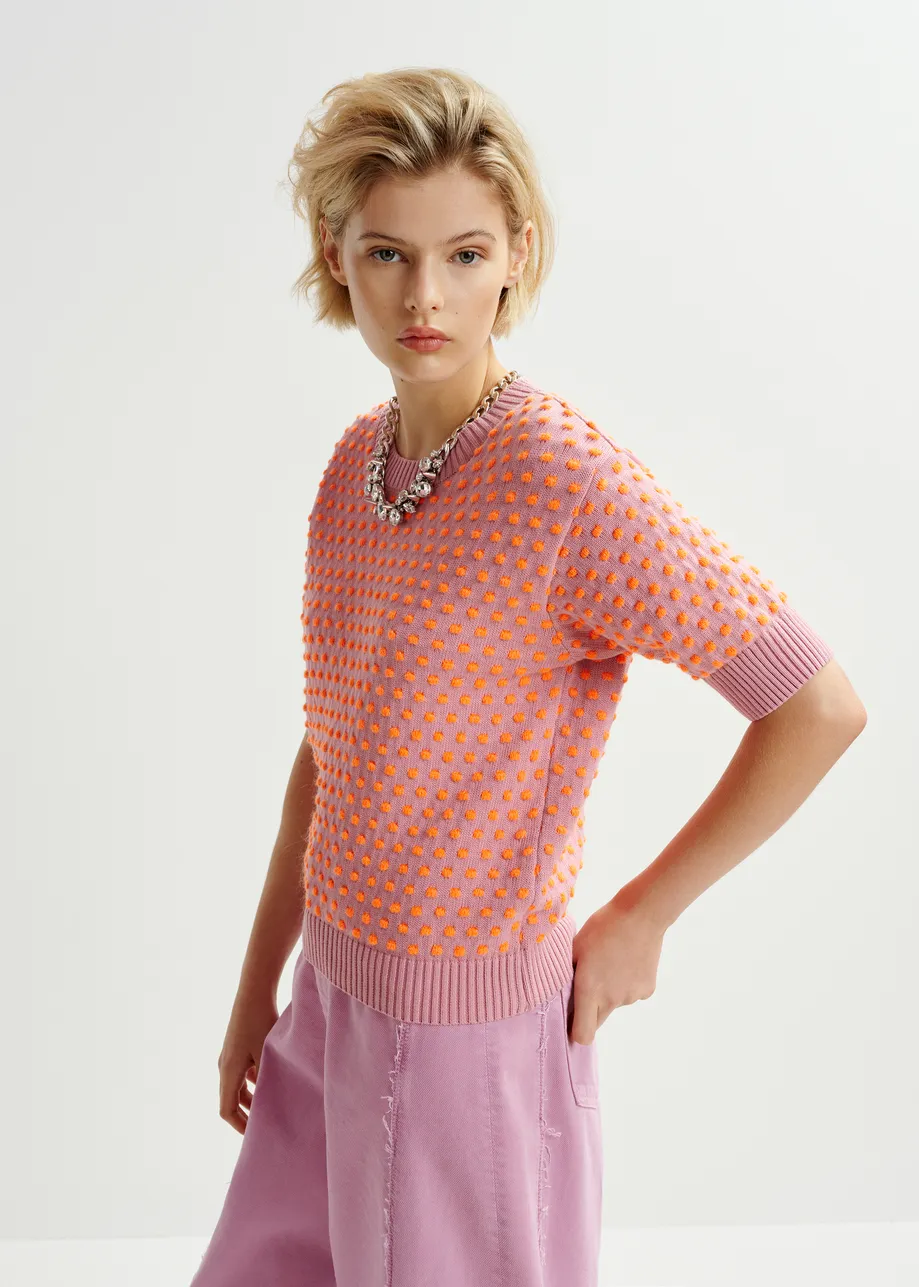 Top in maglia jacquard malva e arancio con motivo a pois