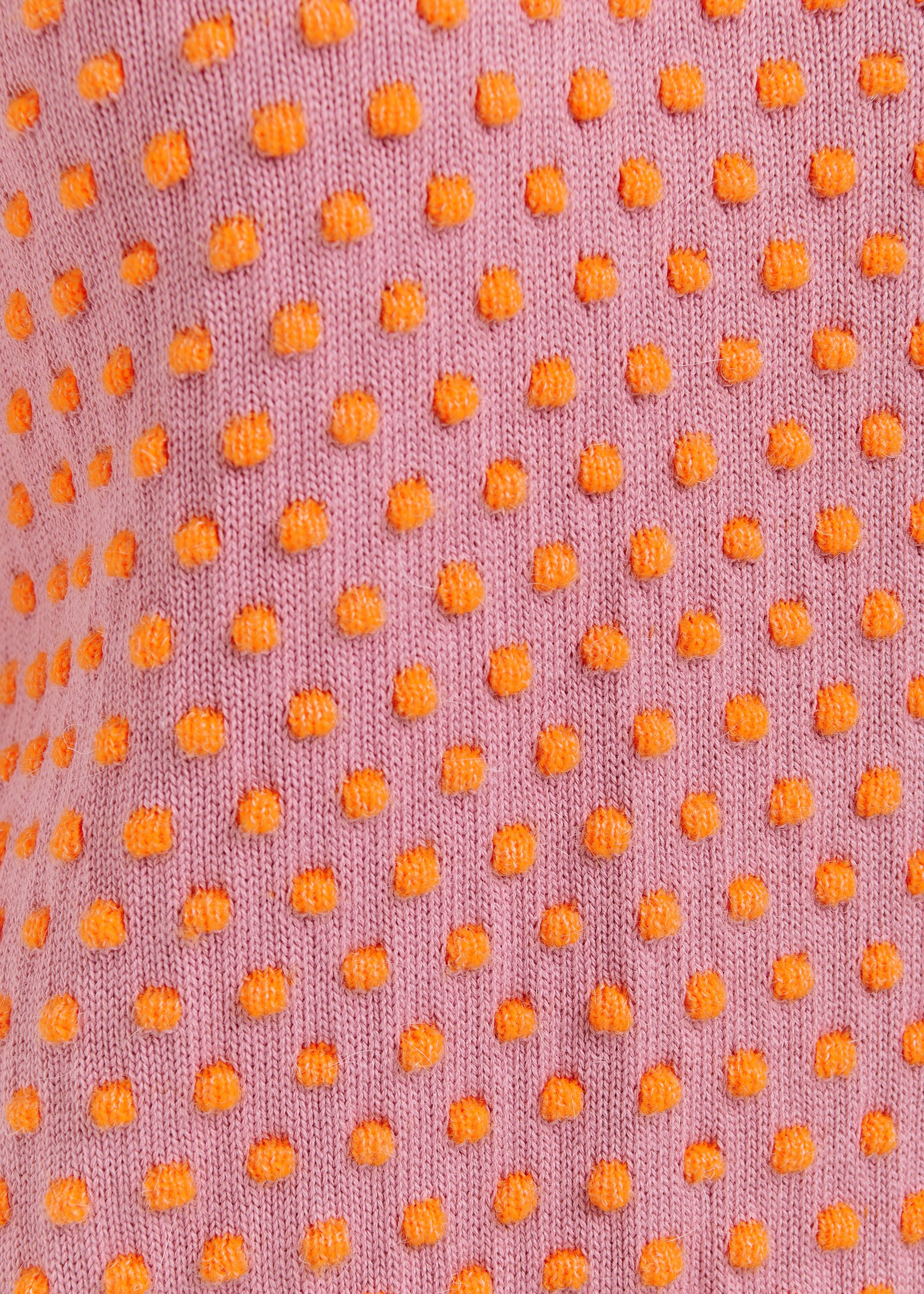Mauve and orange jacquard knit top with polka dot pattern