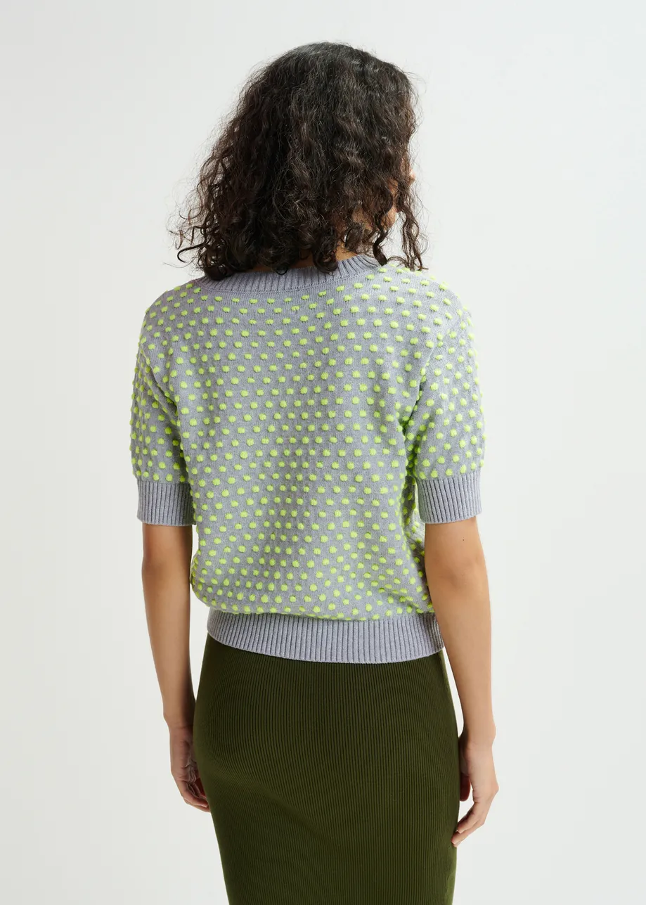 Top in maglia jacquard grigio e giallo con motivo a pois