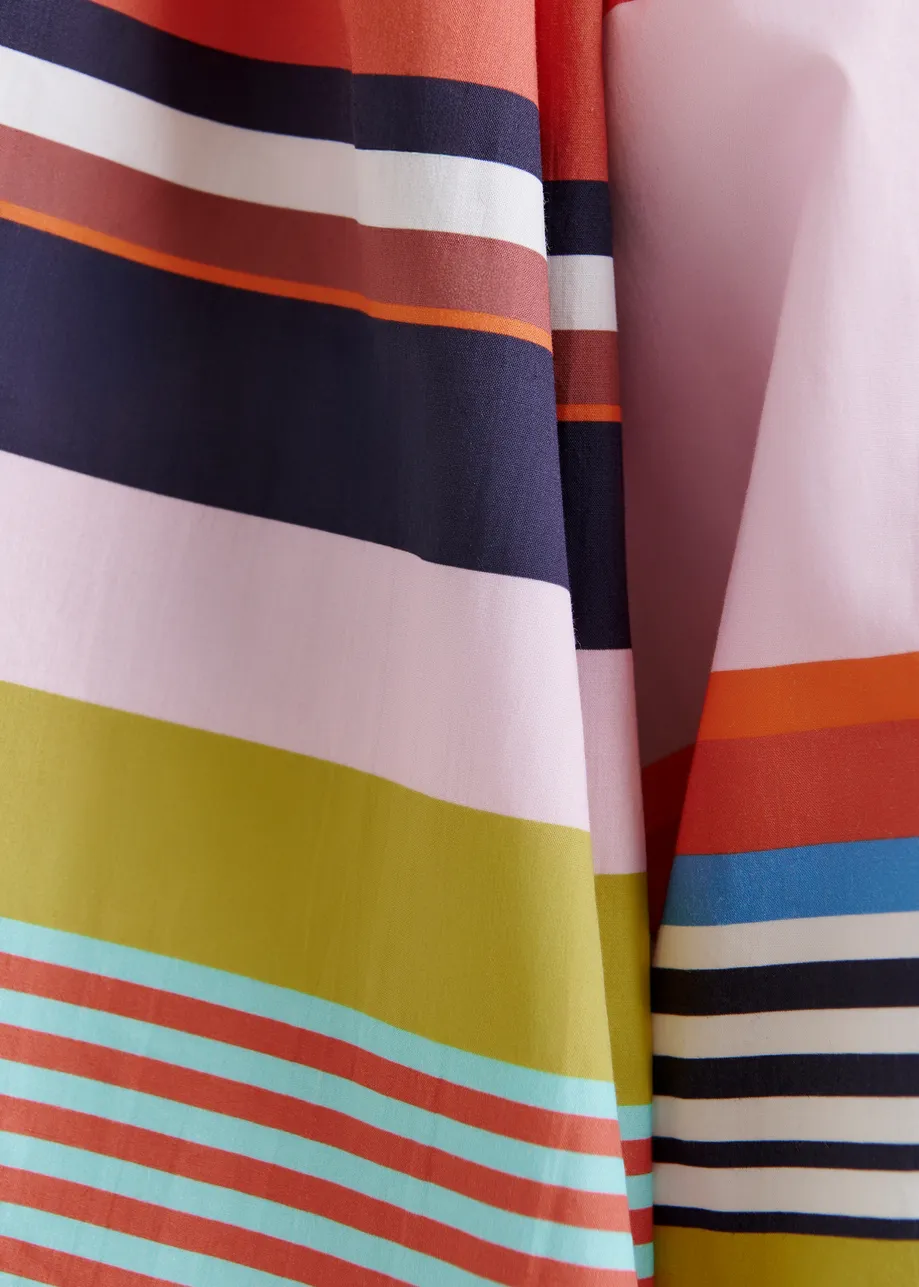 Multicolor cotton striped top with ruffle details, voluminous sleeves, and self-tie collar