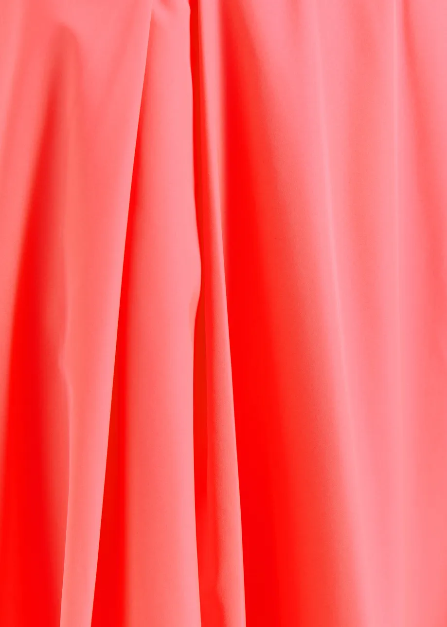 Coral pleated midi skirt