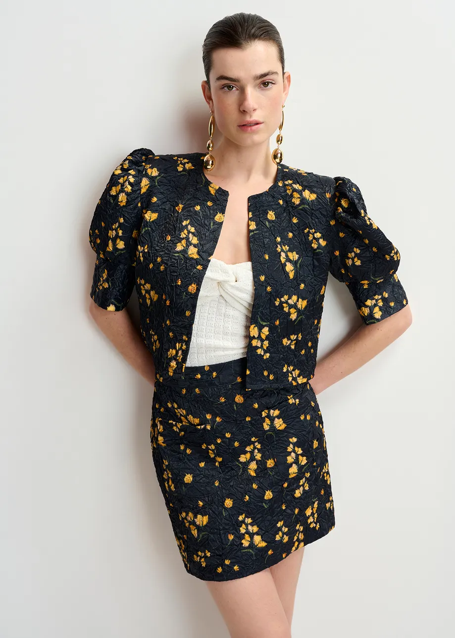 Black floral-print cropped jacket with puffed shoulders