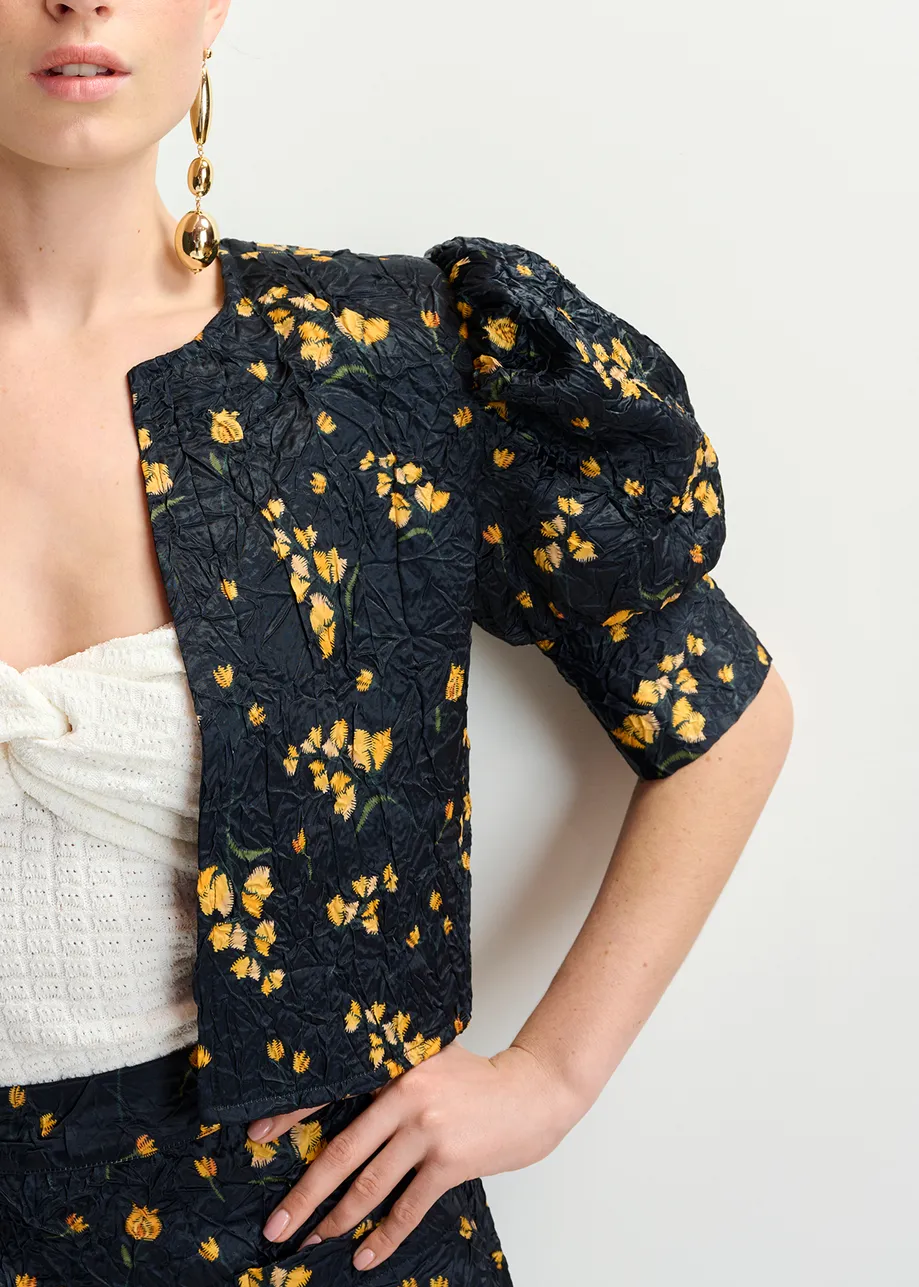 Black floral-print cropped jacket with puffed shoulders