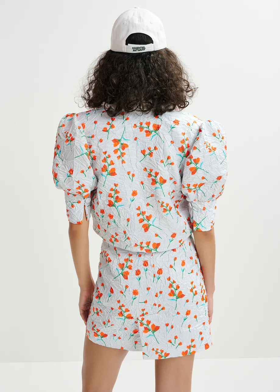 Veste courte blanche à imprimé fleuri et épaules bouffantes