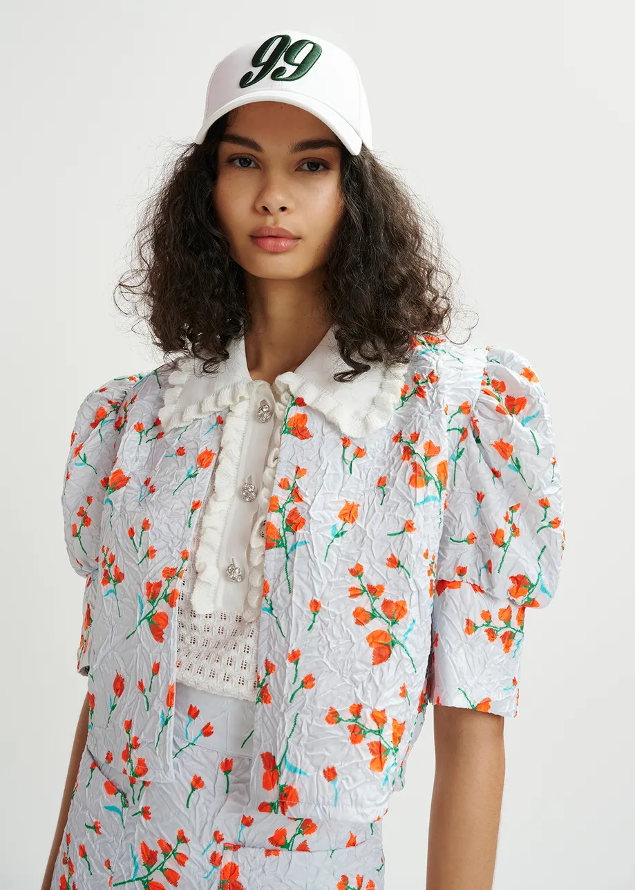 White floral-print cropped jacket with puffed shoulders