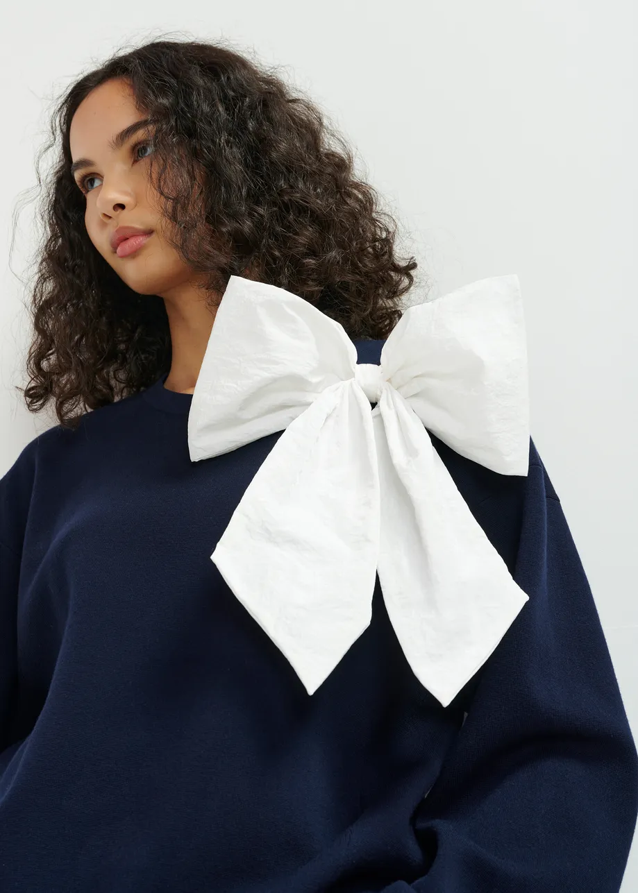  Dark blue and white sweater with removable bow detail