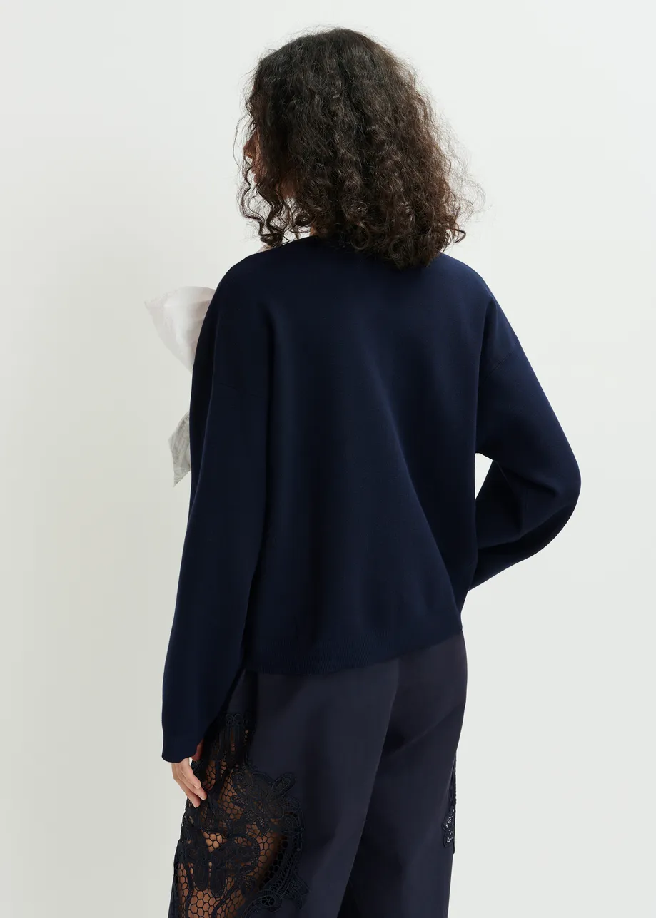  Pull bleu foncé et blanc avec nœud amovible