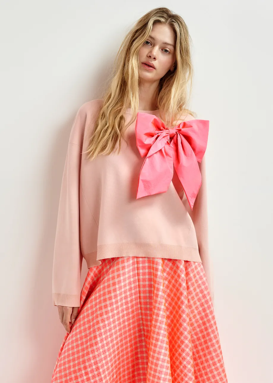 Dusty pink and bright pink sweater with removable bow detail