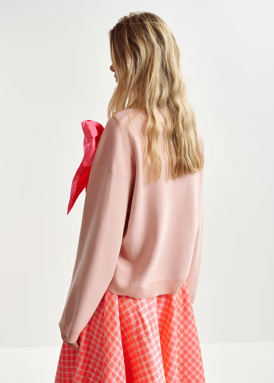 Dusty pink and bright pink sweater with removable bow detail