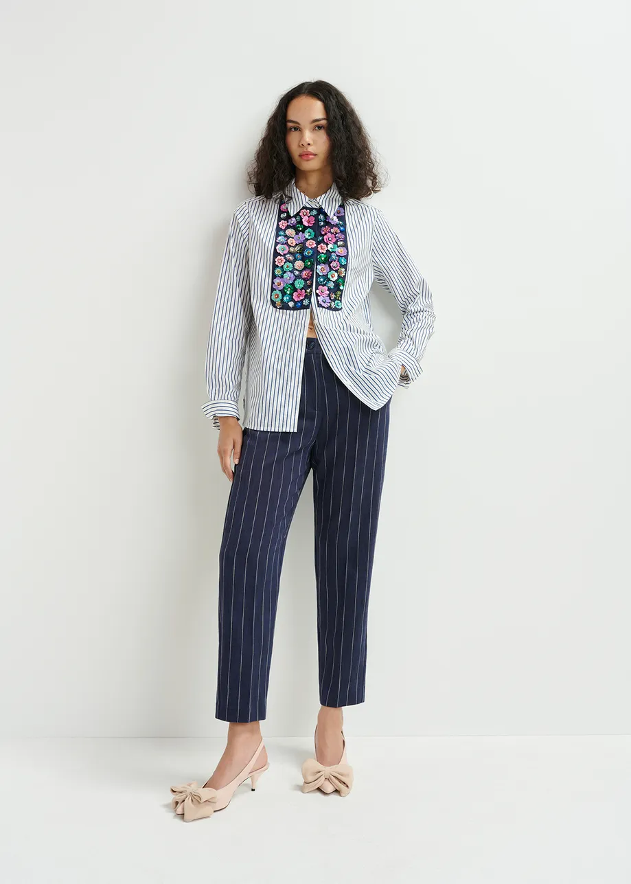 Dark blue and white pinstripe pants.