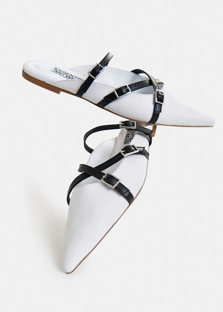 Off-white and black leather slip-on mules