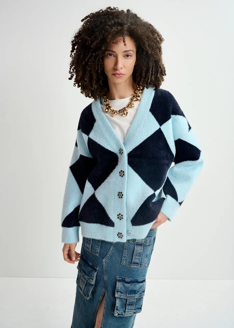 Blue harlequin-patterned knit cardigan with flower-shaped buttons

