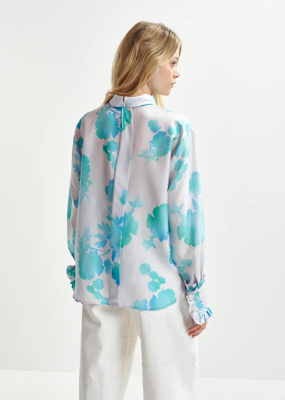 Gebroken witte en blauwe zijden top met bloemenprint