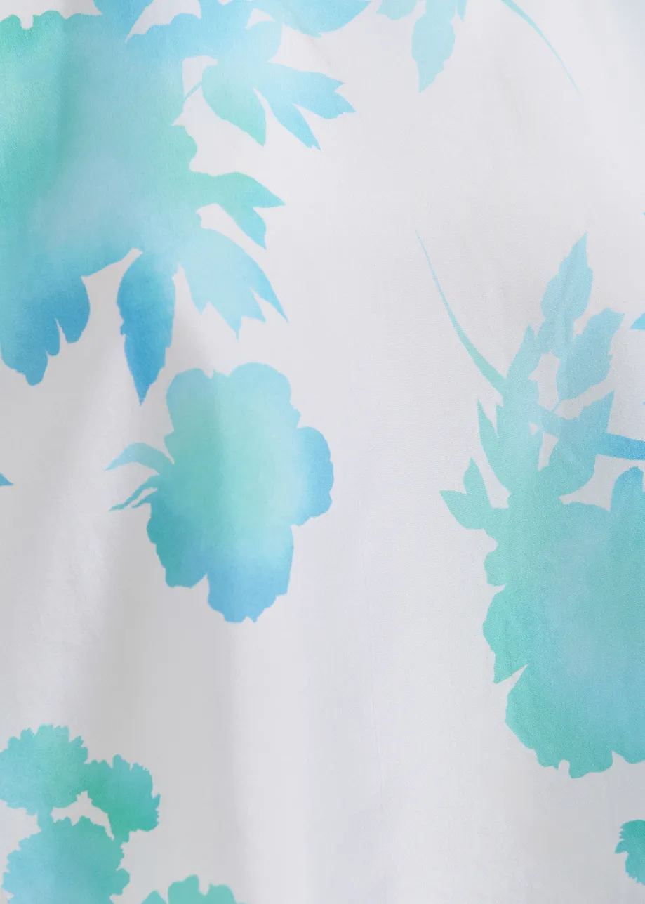 Gebroken witte en blauwe zijden top met bloemenprint