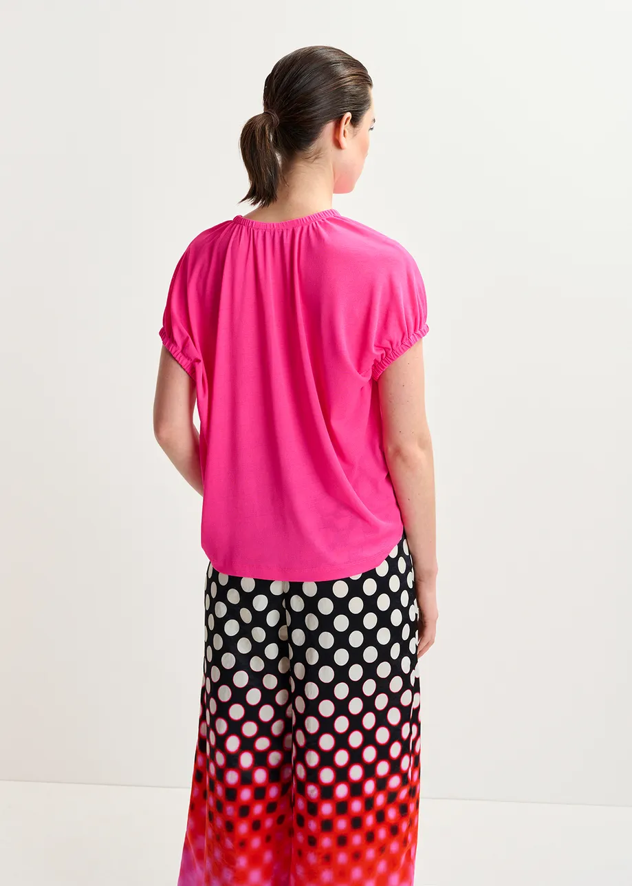 Roze T-shirt met delicate rug