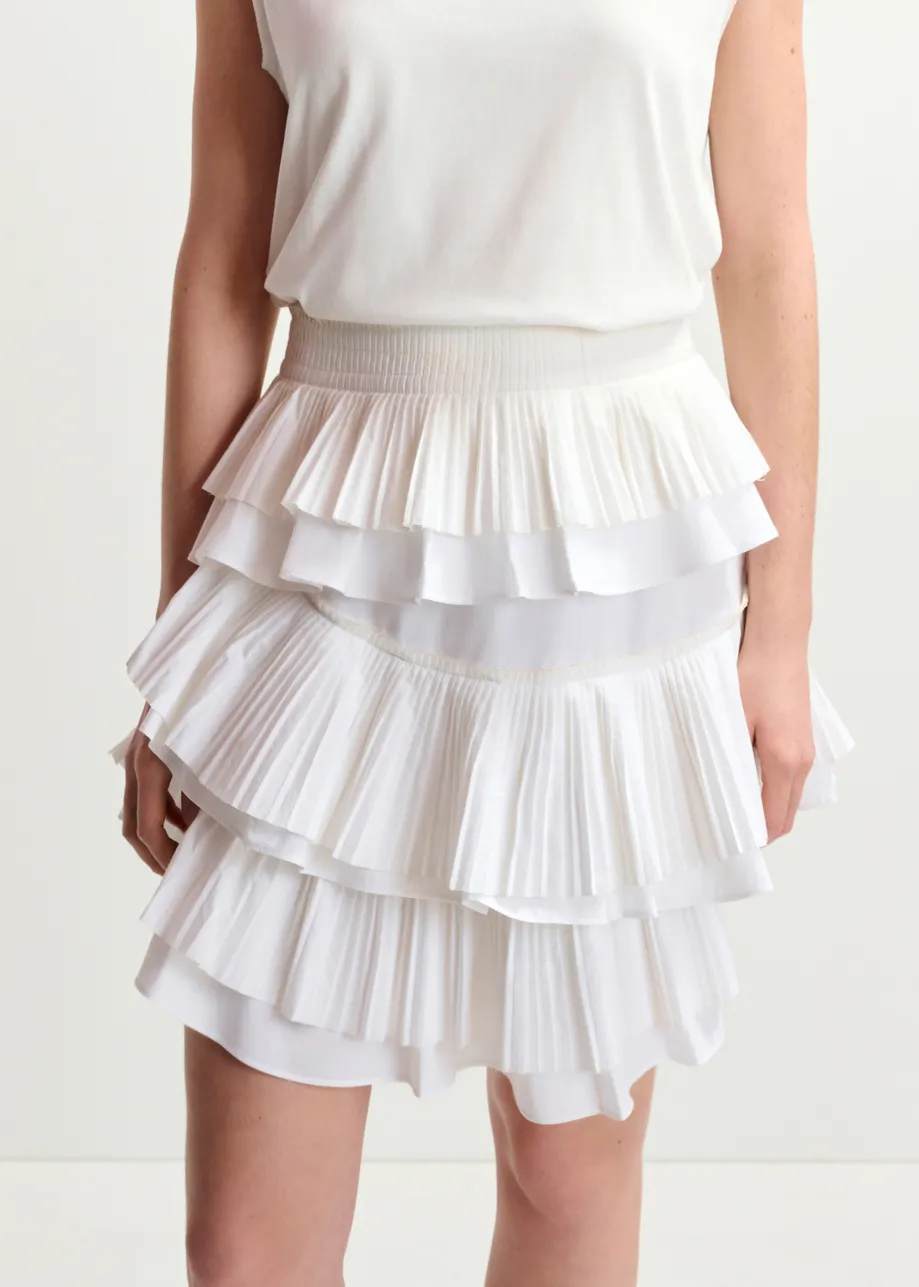 White asymetrical layered mini skirt