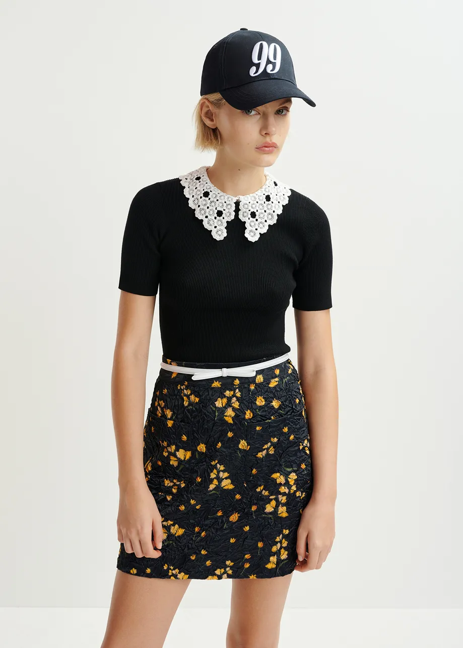 Black floral-print mini skirt