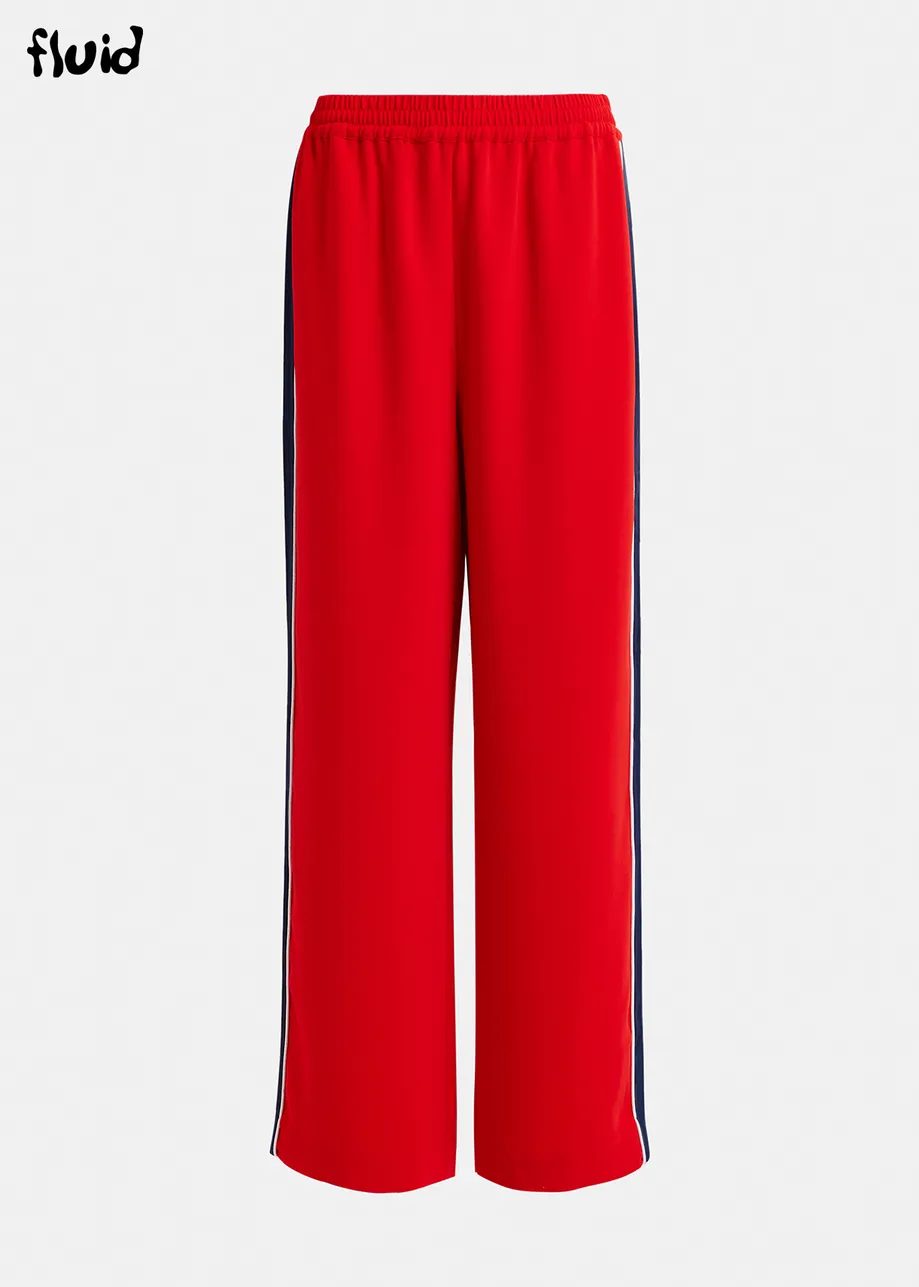 Red and dark blue wide-leg pants with contrast border