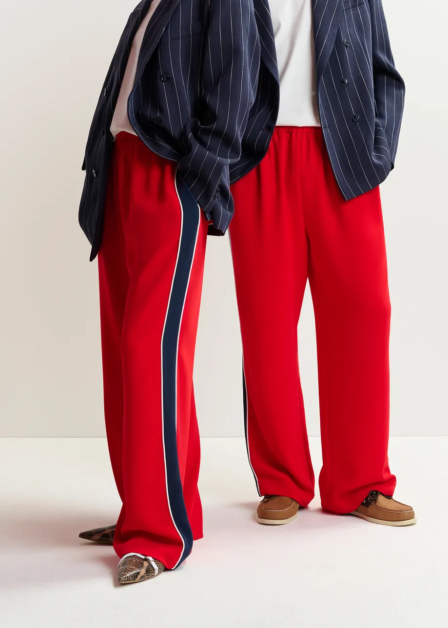 Red and dark blue wide-leg pants with contrast border