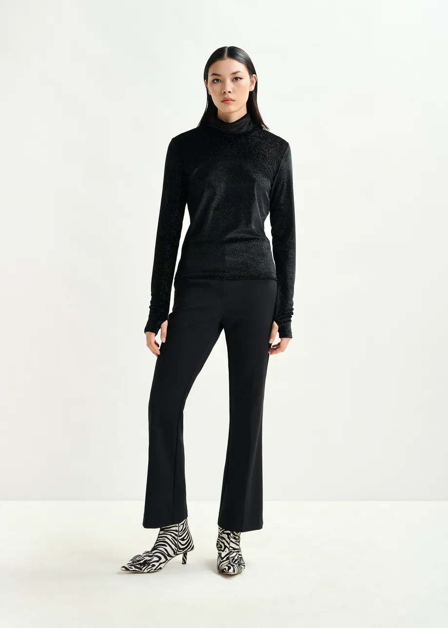 Black flared pants with rhinestone-embellished sideseams