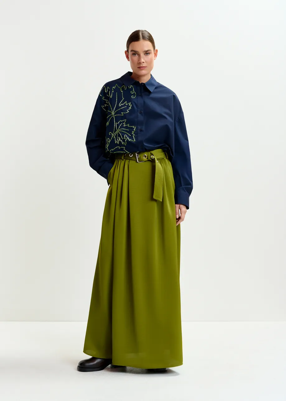 Olive green pleated akle-length skirt with belted waist
