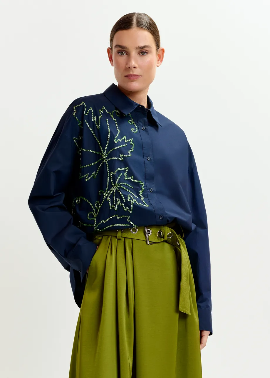 Olive green pleated akle-length skirt with belted waist