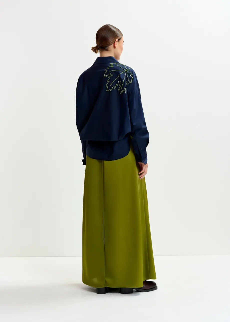 Olive green pleated akle-length skirt with belted waist