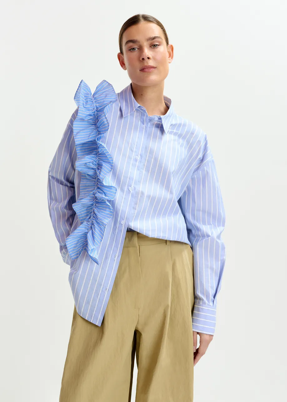 Blue and white striped cotton shirt with ruffle detail
