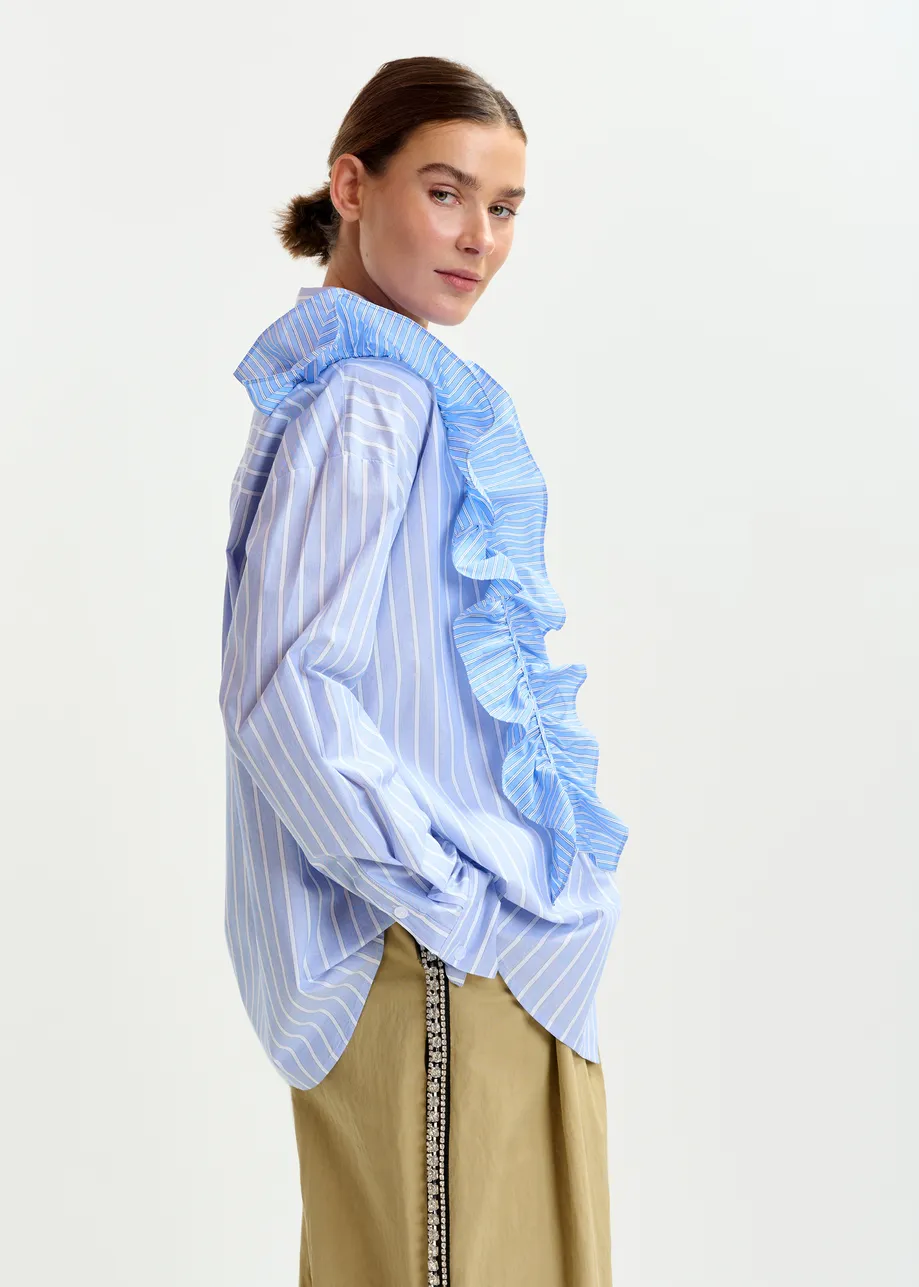 Blue and white striped cotton shirt with ruffle detail