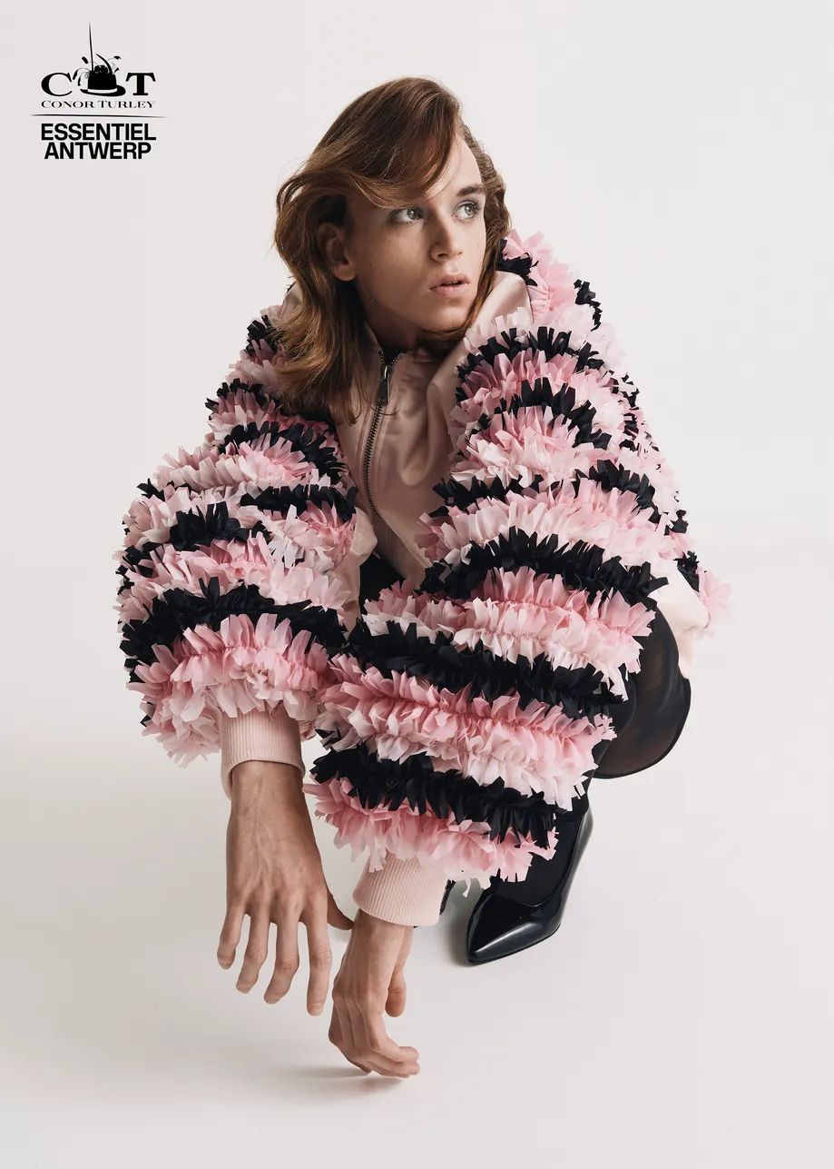 Champagne satin bomber jacket with pink and black ruffled inserts