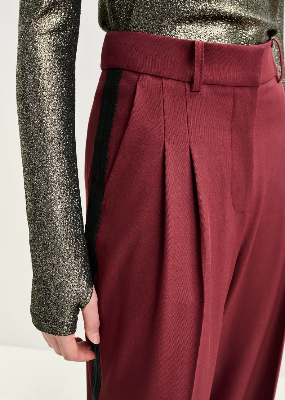 Burgundy tapered pants with crease
