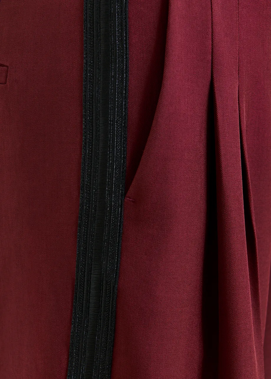 Burgundy tapered pants with crease