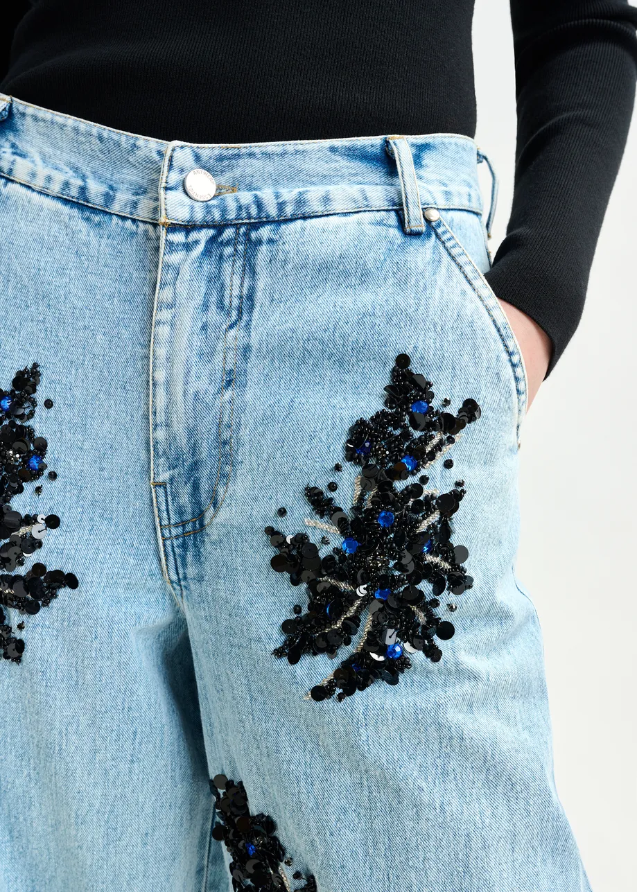 Blue and black embellished wide-leg jeans