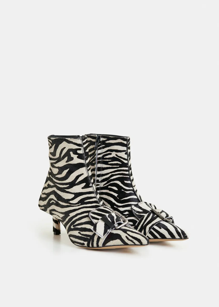 Black and white zebra print leather ankle boots with kitten heel and buckle detail
