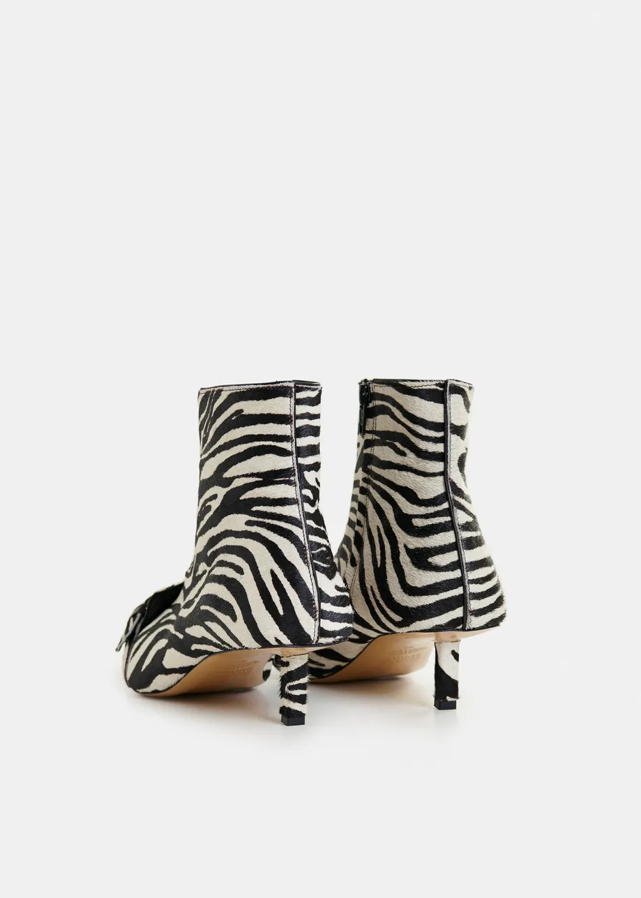Black and white zebra print leather ankle boots with kitten heel and buckle detail