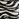 Black and white zebra print leather ankle boots with kitten heel and buckle detail