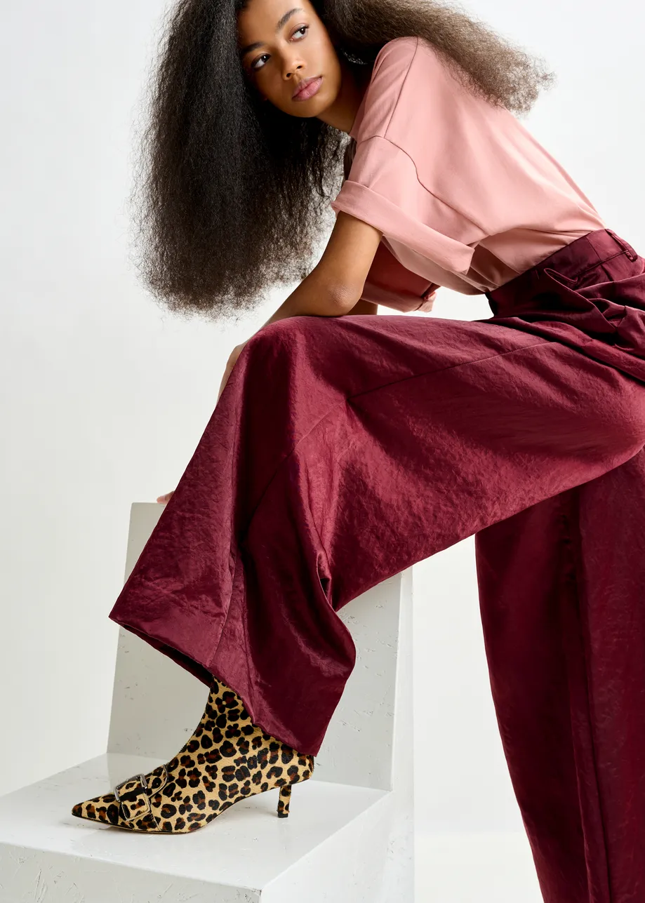 Brown and black leopard print leather ankle boots with kitten heel and buckle detail