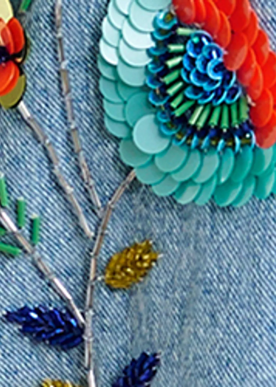 Blue and multicolor denim shirt with sequin flower embellishments