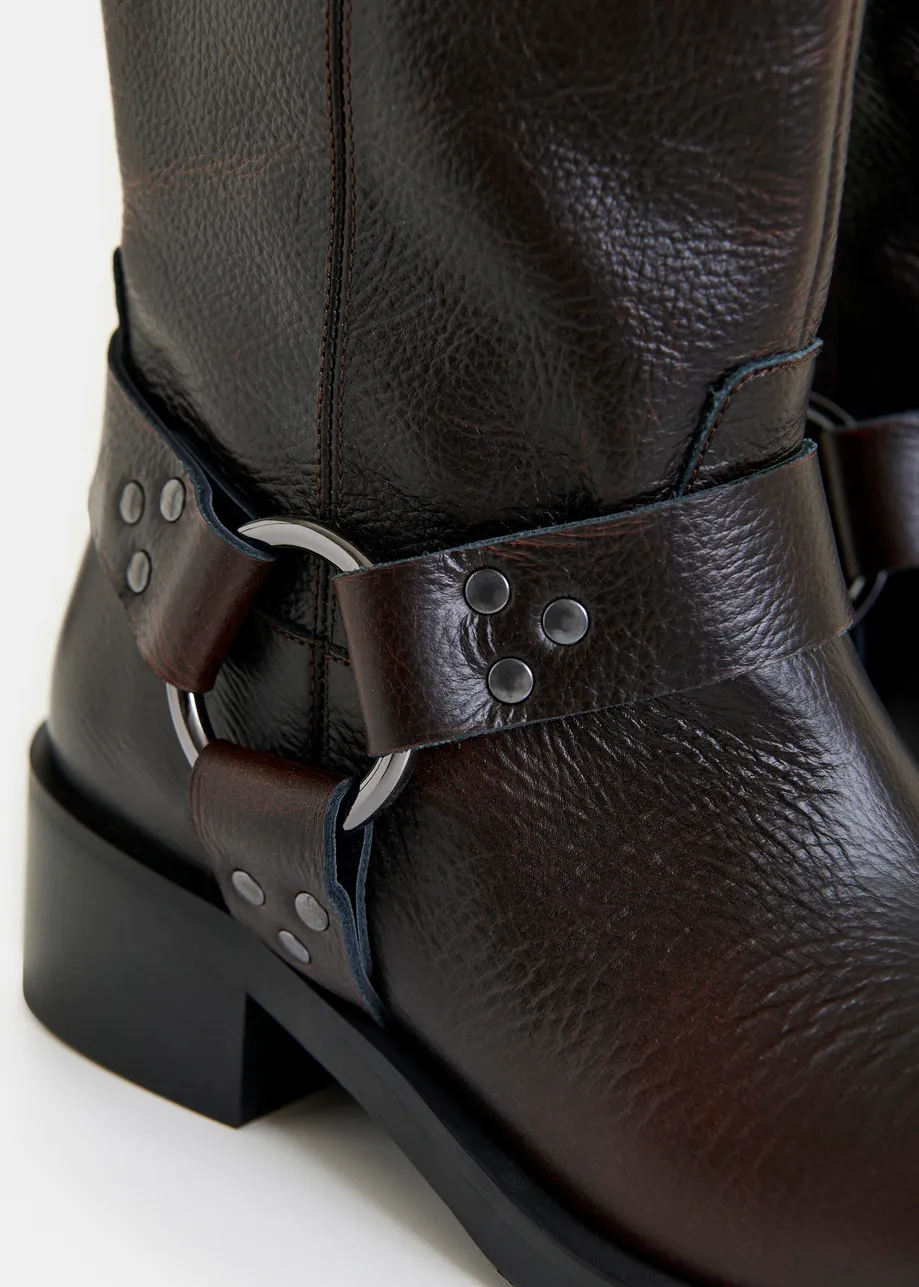 Black leather buckled boots