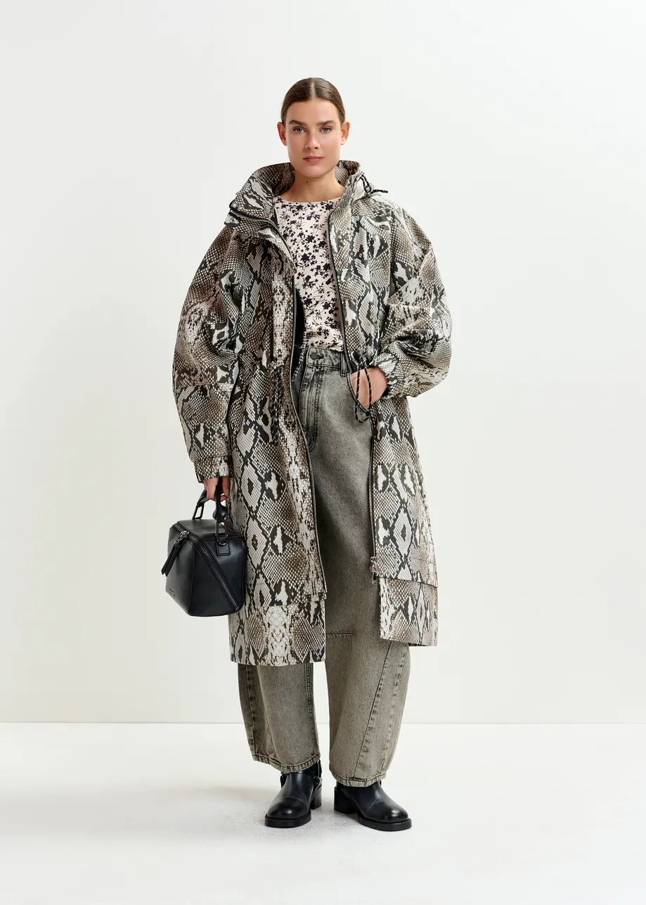 Green, beige and black oversized hooded raincoat