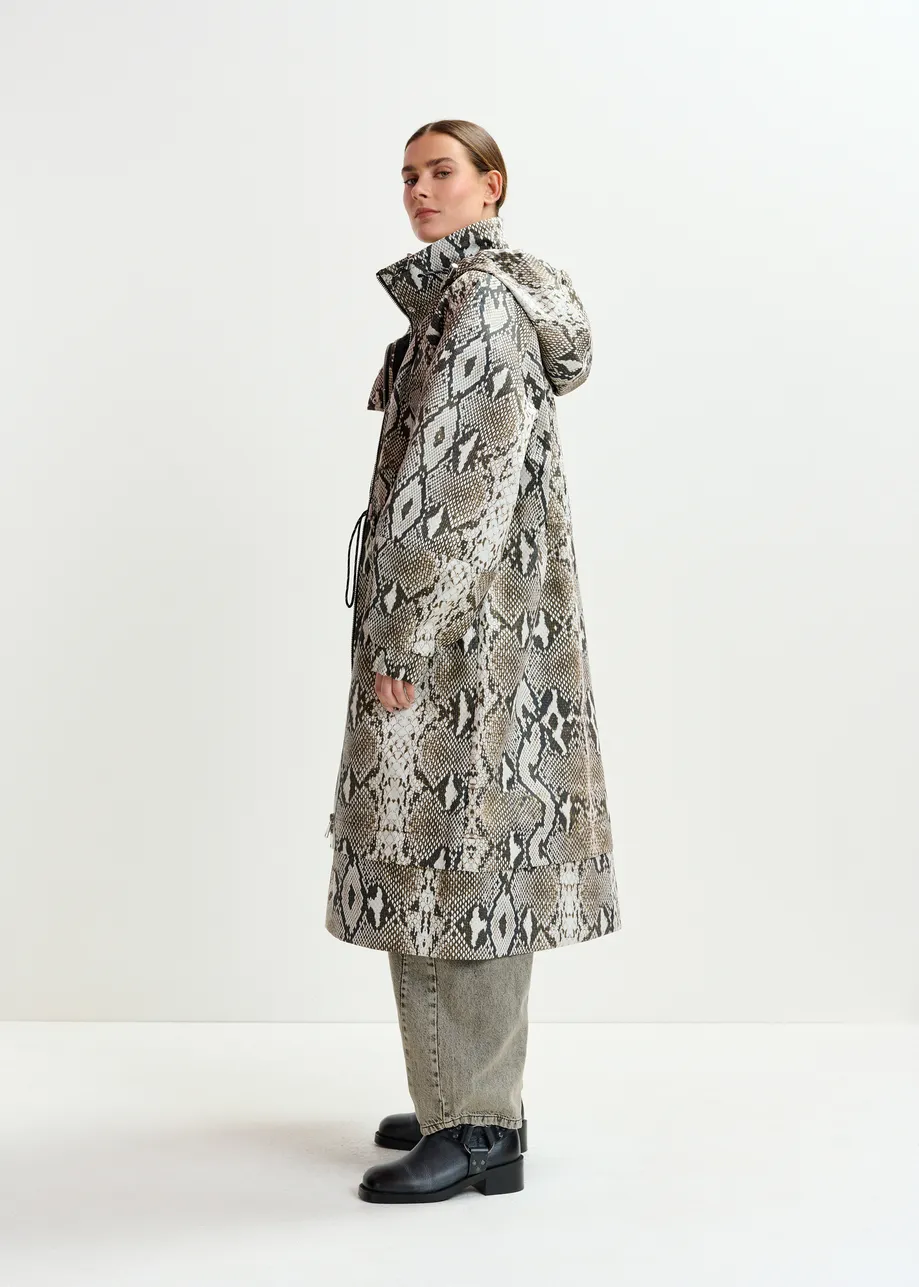 Green, beige and black oversized hooded raincoat