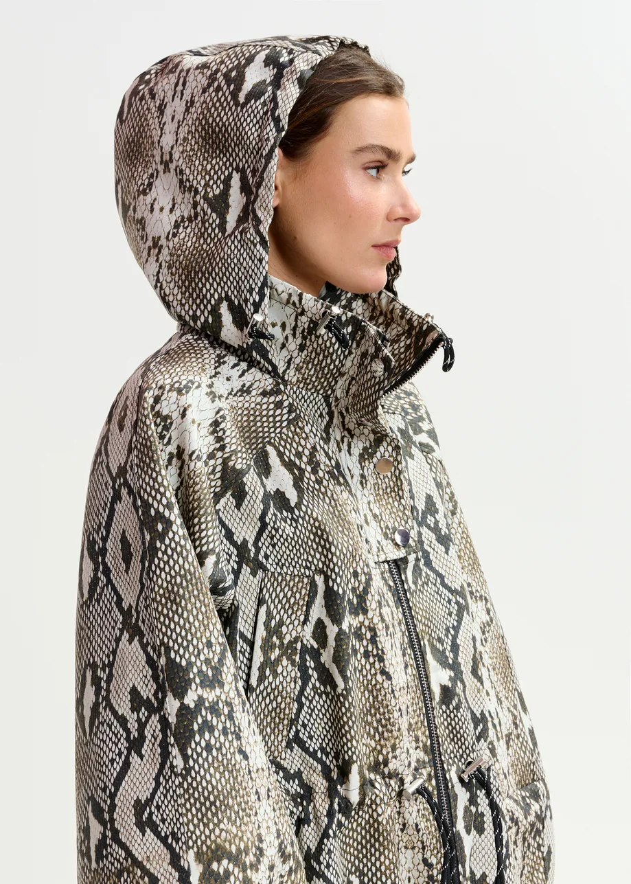 Green, beige and black oversized hooded raincoat