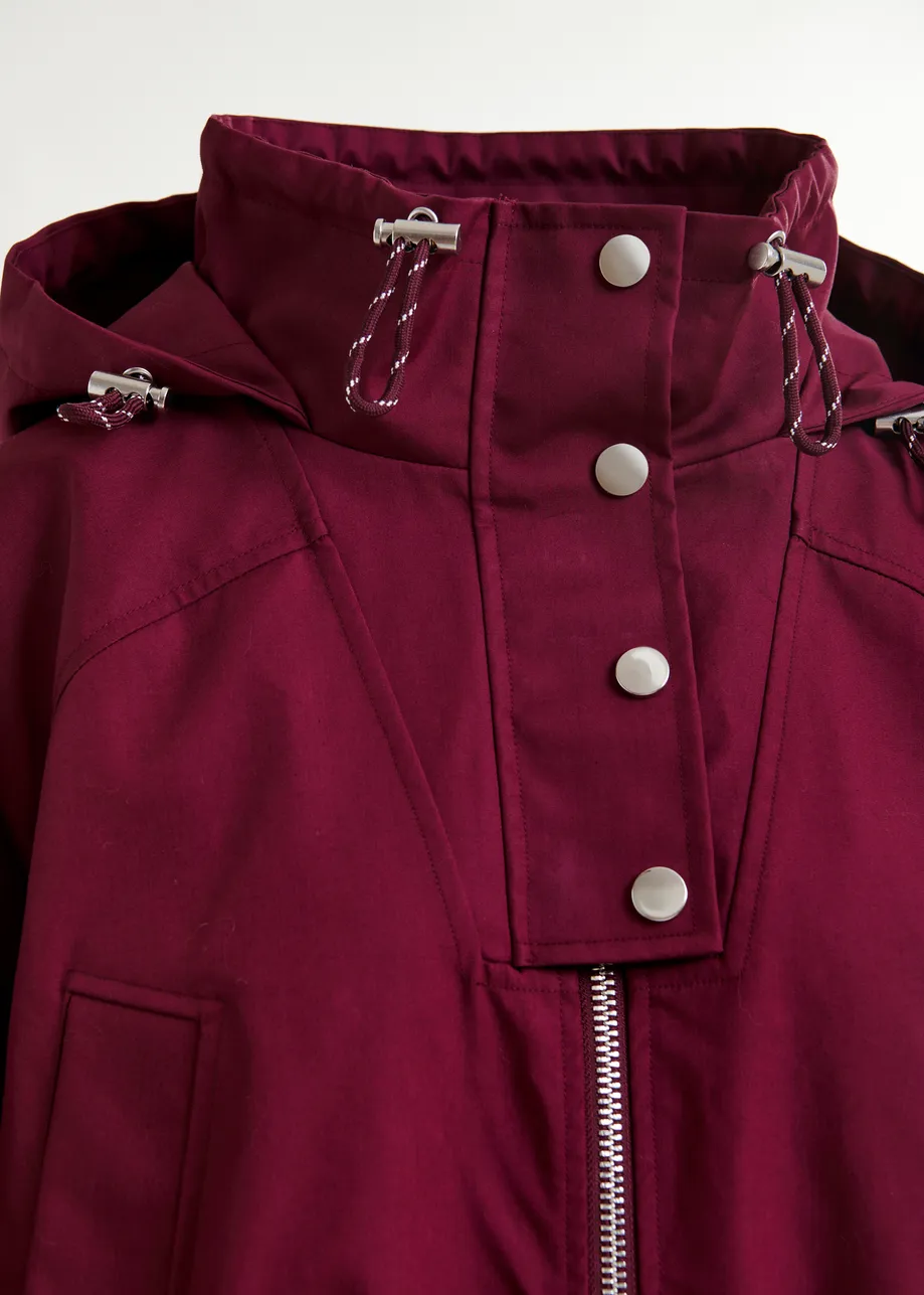 Burgundy oversized hooded raincoat