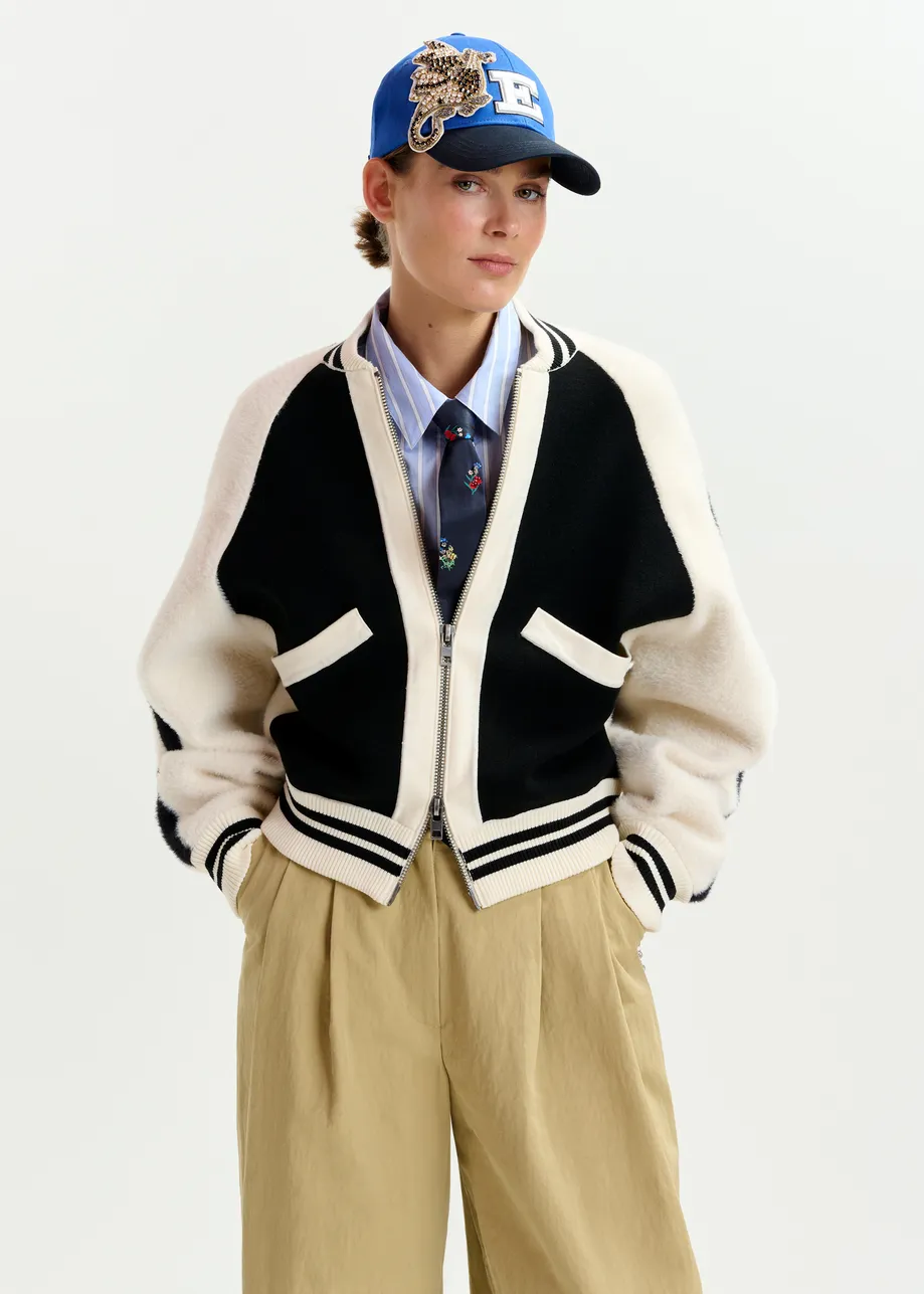 Black and white faux fur-panelled knitted bomber jacket